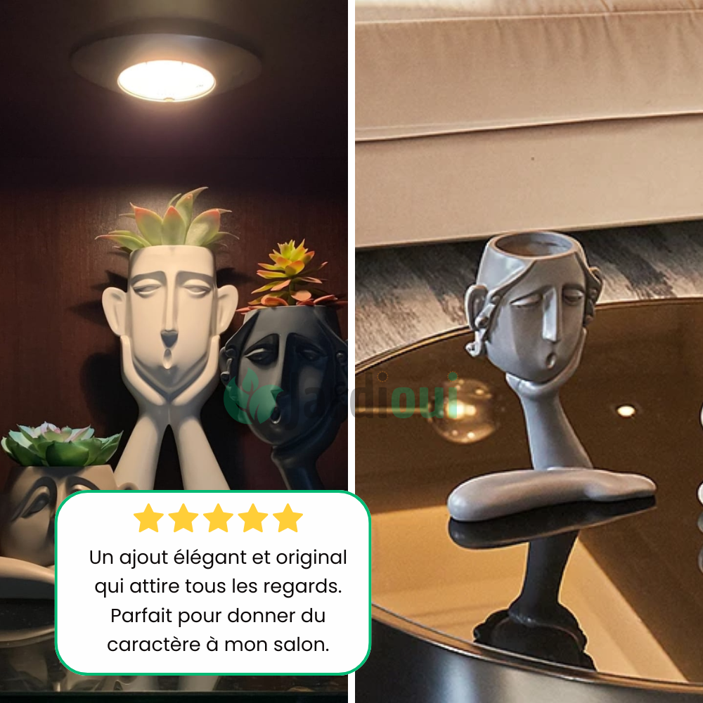 Vaso da fiori con eleganti volti artistici